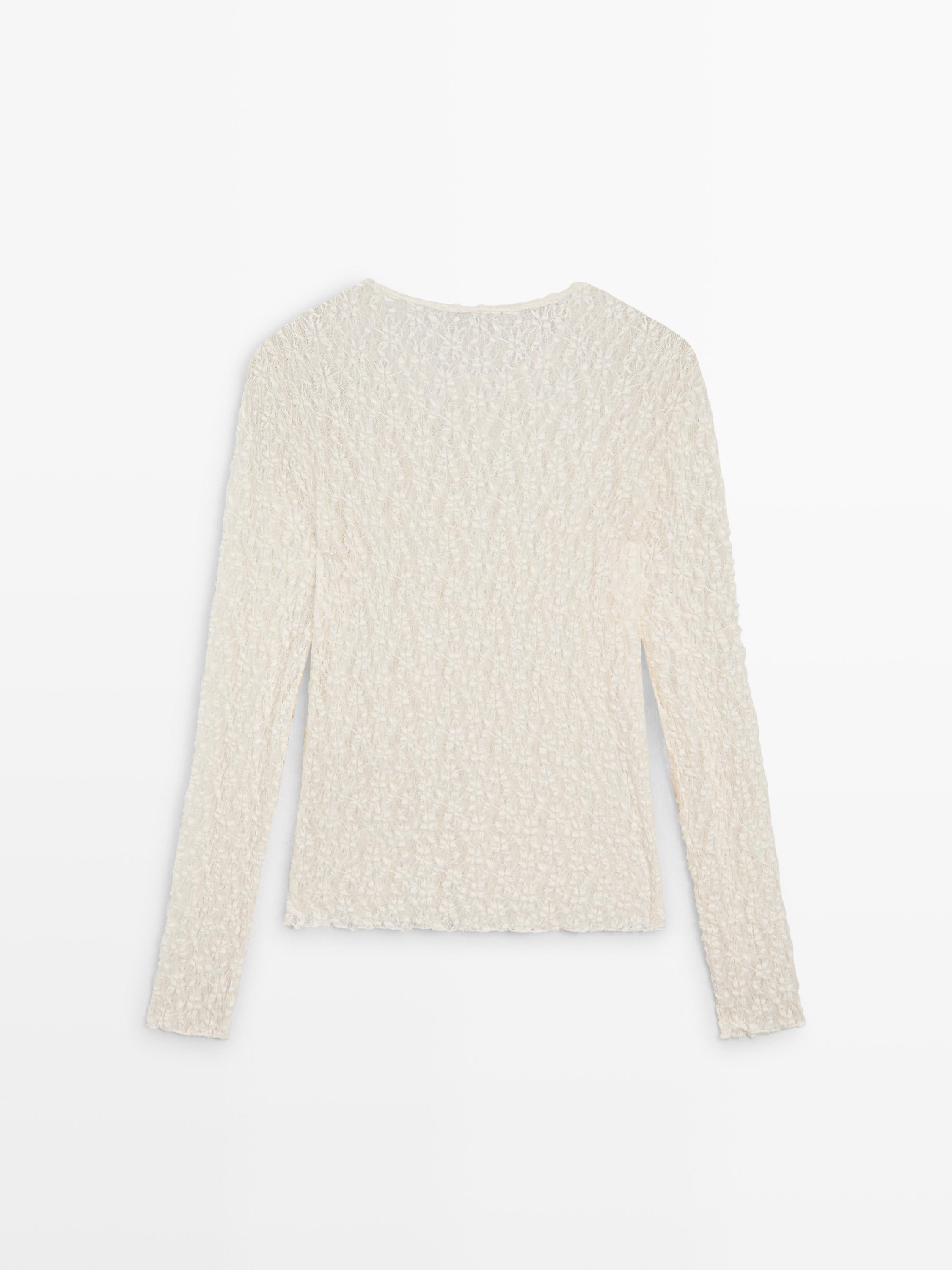 Top en maille de dentelle ajourée à manches longues